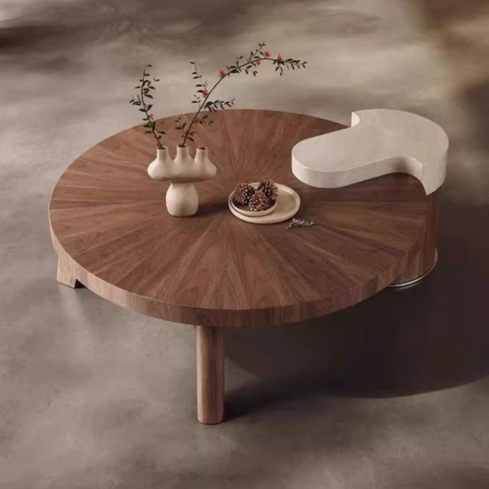 modern coffee table ; wood and marble table ; designer coffee table ; contemporary furniture ; luxury living room table ; round coffee table ; artistic coffee table ; statement furniture ; minimalist home decor ; high-end coffee table