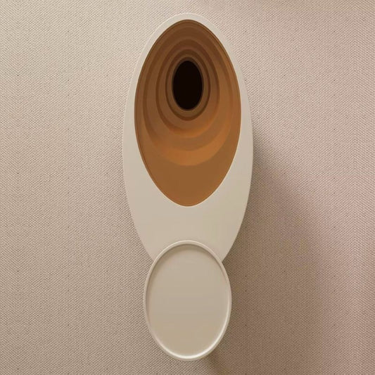  sculptural coffee table ; glass-top table ; high-end living room table ; artistic coffee table ; minimalist furniture ; designer coffee table ; swirl coffee table ; stylish coffee table ; wooden coffee table
