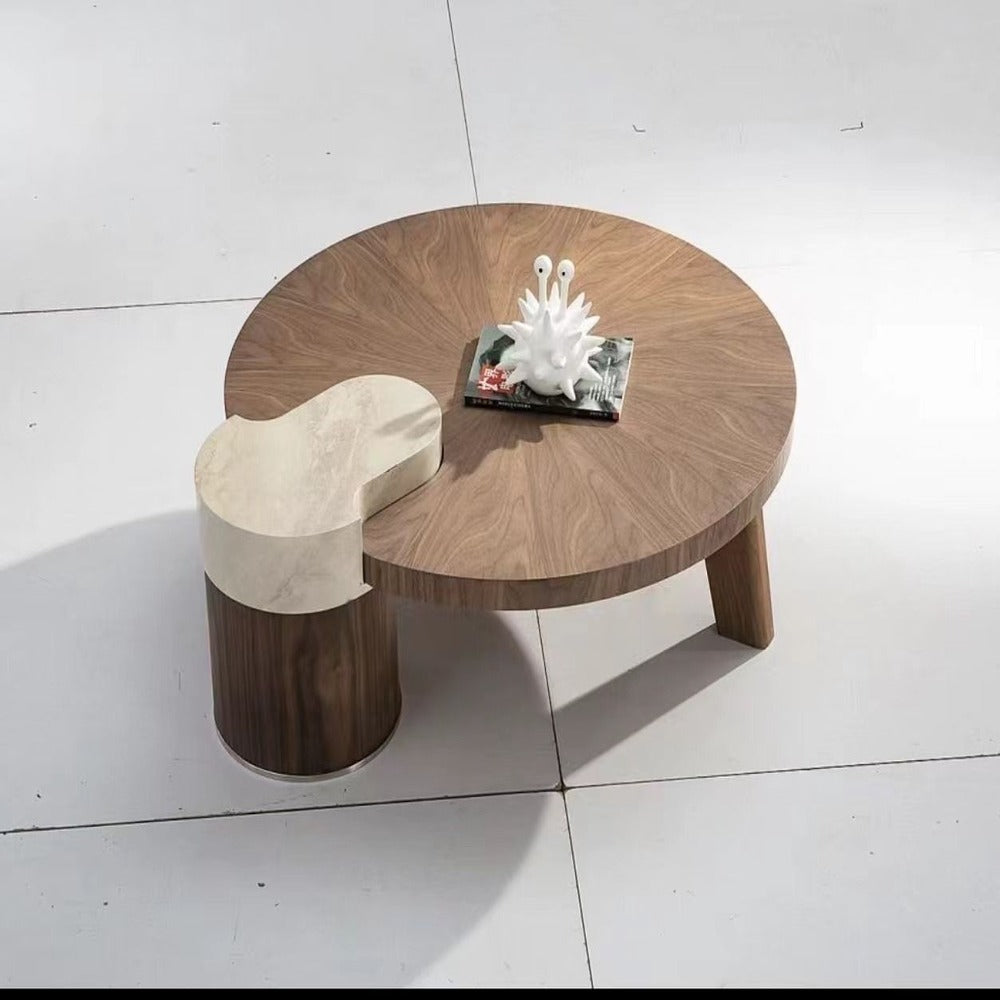 modern coffee table ; wood and marble table ; designer coffee table ; contemporary furniture ; luxury living room table ; round coffee table ; artistic coffee table ; statement furniture ; minimalist home decor ; high-end coffee table