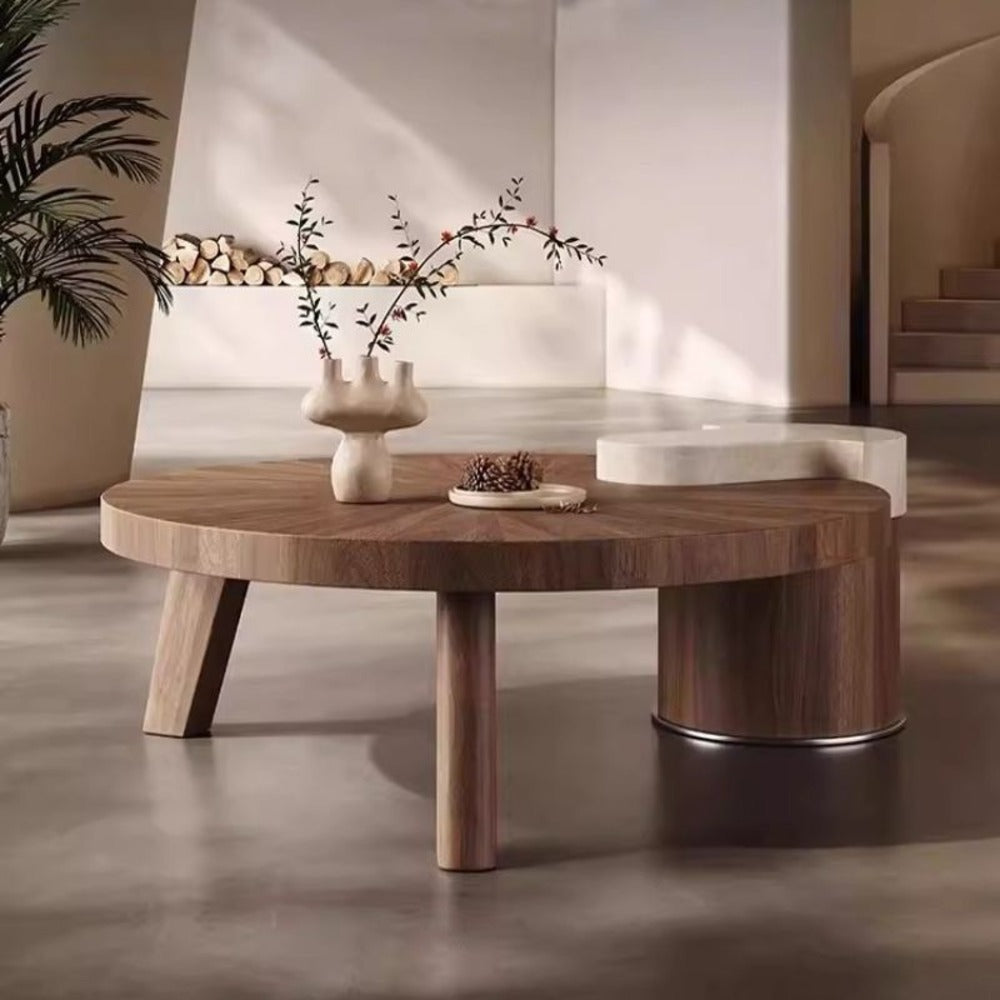 modern coffee table ; wood and marble table ; designer coffee table ; contemporary furniture ; luxury living room table ; round coffee table ; artistic coffee table ; statement furniture ; minimalist home decor ; high-end coffee table